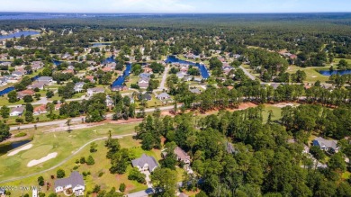 Nestled along the fairway in the gated, amenity-rich community on Harbour Point Golf Club in North Carolina - for sale on GolfHomes.com, golf home, golf lot