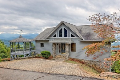 Breathtaking views abound from this 3-bedroom, 3.5-bath home on on Chatuge Shores Golf Course in North Carolina - for sale on GolfHomes.com, golf home, golf lot