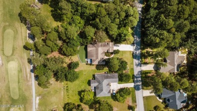 Nestled along the fairway in the gated, amenity-rich community on Harbour Point Golf Club in North Carolina - for sale on GolfHomes.com, golf home, golf lot