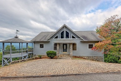 Breathtaking views abound from this 3-bedroom, 3.5-bath home on on Chatuge Shores Golf Course in North Carolina - for sale on GolfHomes.com, golf home, golf lot