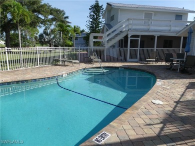 Beautiful home in exclusive Isle of Pines. Close to Pineland on Alden Pines Golf Club in Florida - for sale on GolfHomes.com, golf home, golf lot