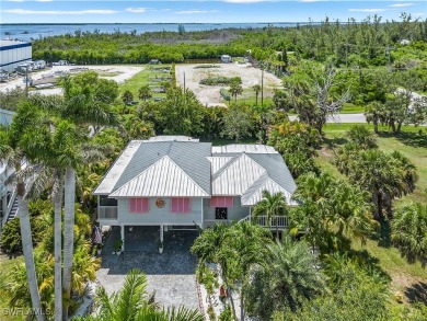 Beautiful home in exclusive Isle of Pines. Close to Pineland on Alden Pines Golf Club in Florida - for sale on GolfHomes.com, golf home, golf lot
