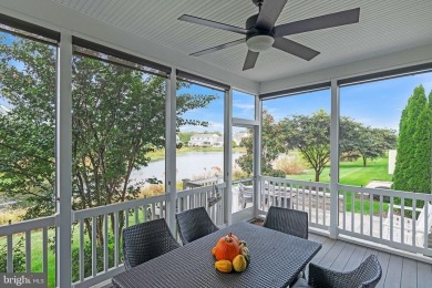 Beautiful Bayside Carriage home overlooking pond with screened on Bayside Resort Golf Club in Delaware - for sale on GolfHomes.com, golf home, golf lot