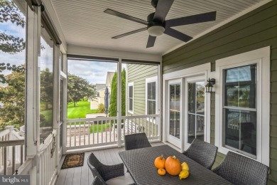 Beautiful Bayside Carriage home overlooking pond with screened on Bayside Resort Golf Club in Delaware - for sale on GolfHomes.com, golf home, golf lot