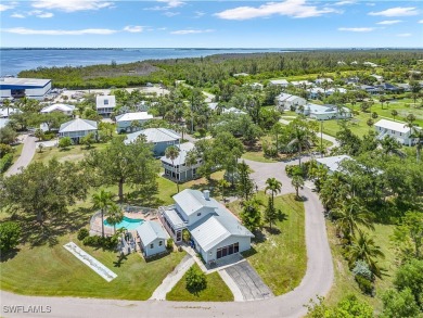 Beautiful home in exclusive Isle of Pines. Close to Pineland on Alden Pines Golf Club in Florida - for sale on GolfHomes.com, golf home, golf lot
