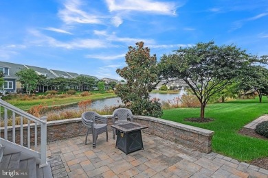 Beautiful Bayside Carriage home overlooking pond with screened on Bayside Resort Golf Club in Delaware - for sale on GolfHomes.com, golf home, golf lot