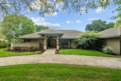 Nestled on an oversized corner lot overlooking the 3rd hole of on Mariner Sands Country Club in Florida - for sale on GolfHomes.com, golf home, golf lot