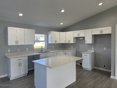 Charming and cozy 4-bedroom, 2 full bath home featuring a on Copperhead Golf Club in Florida - for sale on GolfHomes.com, golf home, golf lot