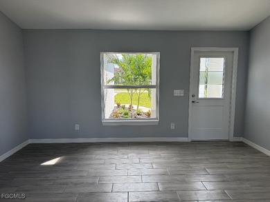 Charming and cozy 4-bedroom, 2 full bath home featuring a on Copperhead Golf Club in Florida - for sale on GolfHomes.com, golf home, golf lot