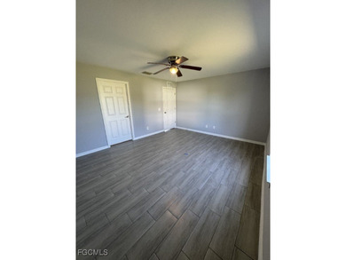 Charming and cozy 4-bedroom, 2 full bath home featuring a on Copperhead Golf Club in Florida - for sale on GolfHomes.com, golf home, golf lot