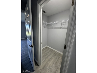 Charming and cozy 4-bedroom, 2 full bath home featuring a on Copperhead Golf Club in Florida - for sale on GolfHomes.com, golf home, golf lot