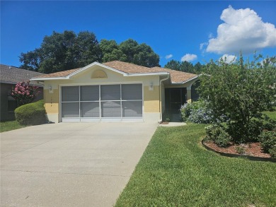 Move-ready 3 bedroom, 2 bath villa in Brentwood with 9 hole on Brentwood Farms Golf Club in Florida - for sale on GolfHomes.com, golf home, golf lot