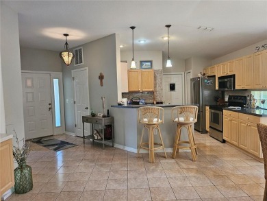 Move-ready 3 bedroom, 2 bath villa in Brentwood with 9 hole on Brentwood Farms Golf Club in Florida - for sale on GolfHomes.com, golf home, golf lot