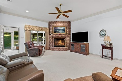 NEAT AS A PIN 3-2.5-2 home with golf cart garage located on on Pecan Plantation Country Club in Texas - for sale on GolfHomes.com, golf home, golf lot