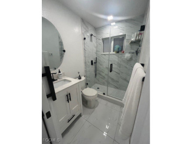 Welcome to your Dream Home! Fully remodeled in 2022, this home on Trump International Golf Club West Palm Beach in Florida - for sale on GolfHomes.com, golf home, golf lot