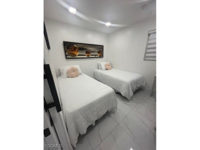 Welcome to your Dream Home! Fully remodeled in 2022, this home on Trump International Golf Club West Palm Beach in Florida - for sale on GolfHomes.com, golf home, golf lot