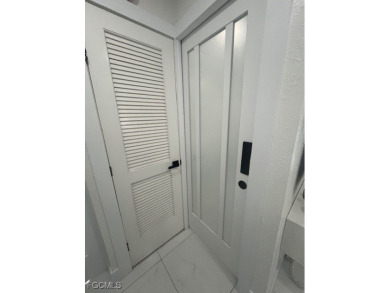 Welcome to your Dream Home! Fully remodeled in 2022, this home on Trump International Golf Club West Palm Beach in Florida - for sale on GolfHomes.com, golf home, golf lot