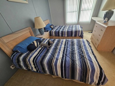 This home is on leased land, meaning buyers do not own the land on Big Cypress Golf and Country Club in Florida - for sale on GolfHomes.com, golf home, golf lot