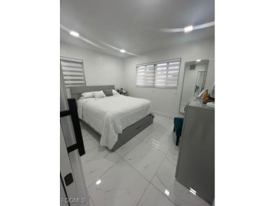 Welcome to your Dream Home! Fully remodeled in 2022, this home on Trump International Golf Club West Palm Beach in Florida - for sale on GolfHomes.com, golf home, golf lot