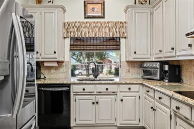 NEAT AS A PIN 3-2.5-2 home with golf cart garage located on on Pecan Plantation Country Club in Texas - for sale on GolfHomes.com, golf home, golf lot