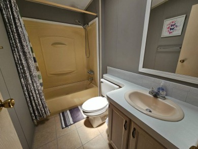 This home is on leased land, meaning buyers do not own the land on Big Cypress Golf and Country Club in Florida - for sale on GolfHomes.com, golf home, golf lot