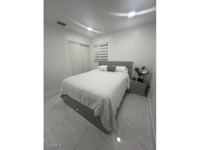 Welcome to your Dream Home! Fully remodeled in 2022, this home on Trump International Golf Club West Palm Beach in Florida - for sale on GolfHomes.com, golf home, golf lot