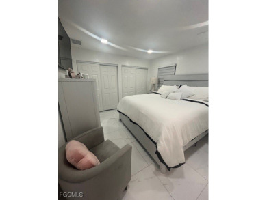 Welcome to your Dream Home! Fully remodeled in 2022, this home on Trump International Golf Club West Palm Beach in Florida - for sale on GolfHomes.com, golf home, golf lot