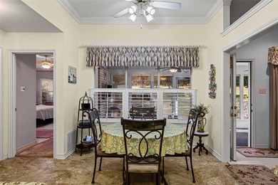 NEAT AS A PIN 3-2.5-2 home with golf cart garage located on on Pecan Plantation Country Club in Texas - for sale on GolfHomes.com, golf home, golf lot