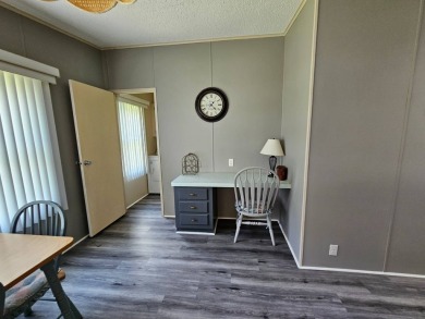 This home is on leased land, meaning buyers do not own the land on Big Cypress Golf and Country Club in Florida - for sale on GolfHomes.com, golf home, golf lot