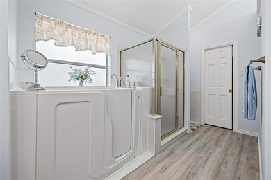 NEAT AS A PIN 3-2.5-2 home with golf cart garage located on on Pecan Plantation Country Club in Texas - for sale on GolfHomes.com, golf home, golf lot