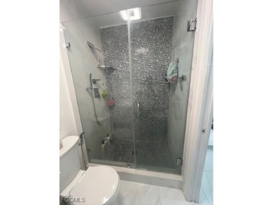 Welcome to your Dream Home! Fully remodeled in 2022, this home on Trump International Golf Club West Palm Beach in Florida - for sale on GolfHomes.com, golf home, golf lot
