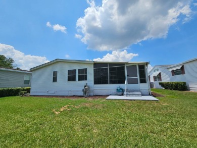 This home is on leased land, meaning buyers do not own the land on Big Cypress Golf and Country Club in Florida - for sale on GolfHomes.com, golf home, golf lot