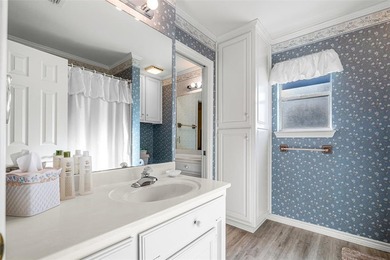 NEAT AS A PIN 3-2.5-2 home with golf cart garage located on on Pecan Plantation Country Club in Texas - for sale on GolfHomes.com, golf home, golf lot