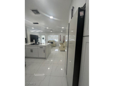 Welcome to your Dream Home! Fully remodeled in 2022, this home on Trump International Golf Club West Palm Beach in Florida - for sale on GolfHomes.com, golf home, golf lot