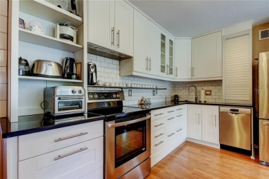 Welcome to carefree living in this spacious ground-floor condo on On Top Of The World Golf Course in Florida - for sale on GolfHomes.com, golf home, golf lot