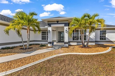 Welcome to 2247 Hamburg Ln, a beautifully renovated 4-bedroom on Deep Creek Golf Club in Florida - for sale on GolfHomes.com, golf home, golf lot