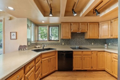Enjoy privacy, charm, and location in this beautifully on Eagle Bend Golf Course in Montana - for sale on GolfHomes.com, golf home, golf lot