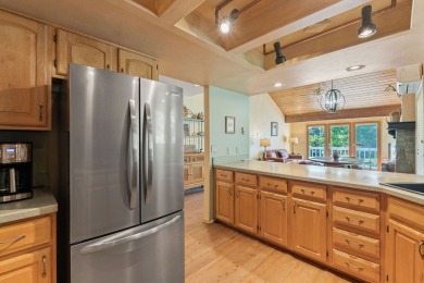 Enjoy privacy, charm, and location in this beautifully on Eagle Bend Golf Course in Montana - for sale on GolfHomes.com, golf home, golf lot