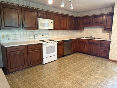 Situated along the scenic #4 fairway, this spacious ranch home on Berea Country Club in Kentucky - for sale on GolfHomes.com, golf home, golf lot