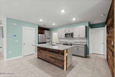 LAKEFRONT 5-bedroom, 3-bathroom, 2-car garage, concrete block on Venetian Bay Golf Course in Florida - for sale on GolfHomes.com, golf home, golf lot