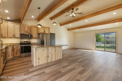 Experience maintenance-free living in this beautifully remodeled on Antelope Hills Golf Course in Wyoming - for sale on GolfHomes.com, golf home, golf lot