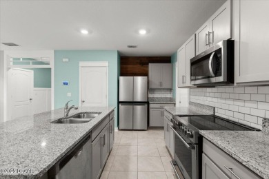 LAKEFRONT 5-bedroom, 3-bathroom, 2-car garage, concrete block on Venetian Bay Golf Course in Florida - for sale on GolfHomes.com, golf home, golf lot