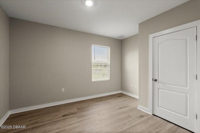 LAKEFRONT 5-bedroom, 3-bathroom, 2-car garage, concrete block on Venetian Bay Golf Course in Florida - for sale on GolfHomes.com, golf home, golf lot