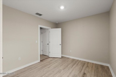 LAKEFRONT 5-bedroom, 3-bathroom, 2-car garage, concrete block on Venetian Bay Golf Course in Florida - for sale on GolfHomes.com, golf home, golf lot