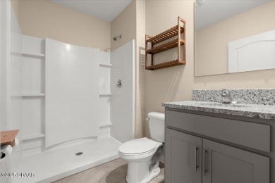 LAKEFRONT 5-bedroom, 3-bathroom, 2-car garage, concrete block on Venetian Bay Golf Course in Florida - for sale on GolfHomes.com, golf home, golf lot