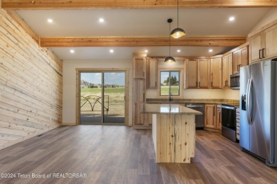 Experience maintenance-free living in this beautifully remodeled on Antelope Hills Golf Course in Wyoming - for sale on GolfHomes.com, golf home, golf lot