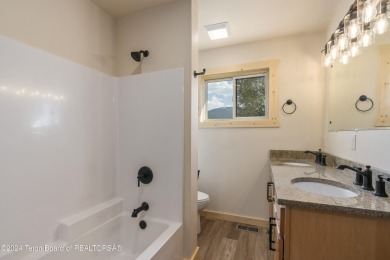 Experience maintenance-free living in this beautifully remodeled on Antelope Hills Golf Course in Wyoming - for sale on GolfHomes.com, golf home, golf lot