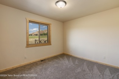 Experience maintenance-free living in this beautifully remodeled on Antelope Hills Golf Course in Wyoming - for sale on GolfHomes.com, golf home, golf lot