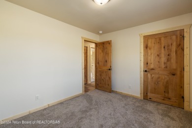 Experience maintenance-free living in this beautifully remodeled on Antelope Hills Golf Course in Wyoming - for sale on GolfHomes.com, golf home, golf lot