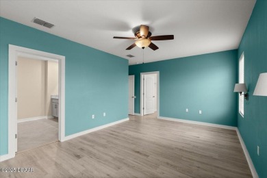 LAKEFRONT 5-bedroom, 3-bathroom, 2-car garage, concrete block on Venetian Bay Golf Course in Florida - for sale on GolfHomes.com, golf home, golf lot